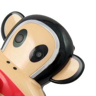 Illustration for article titled Paul Frank Counterfeit Cellphone is Magnificently Gaudy and Monkey Shaped